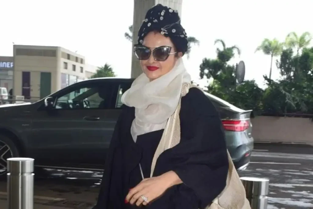 Rekha Criticized For Pushing Fan at Mumbai Airport; Video Goes Viral Rekha pushes fan at airport